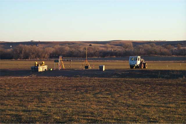 late afternoon sun on GPS equipment and source truck