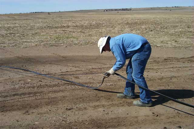 Wrapping cables that cross road limits breakdowns.